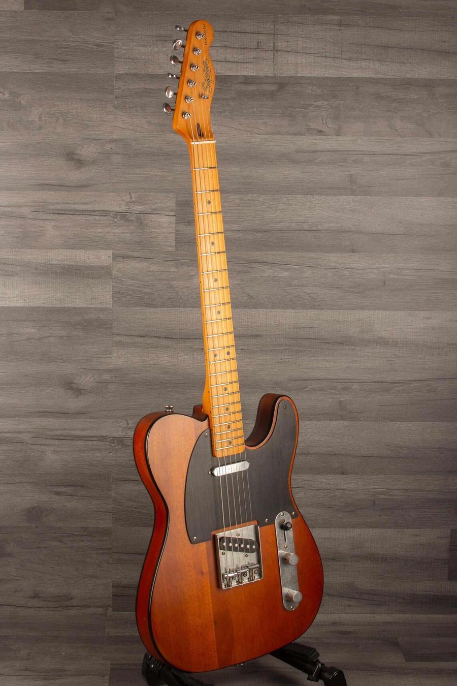 USED - Squier 40th Anniversary Telecaster vintage edition in Satin Mocha finish, showcasing excellent condition and craftsmanship.