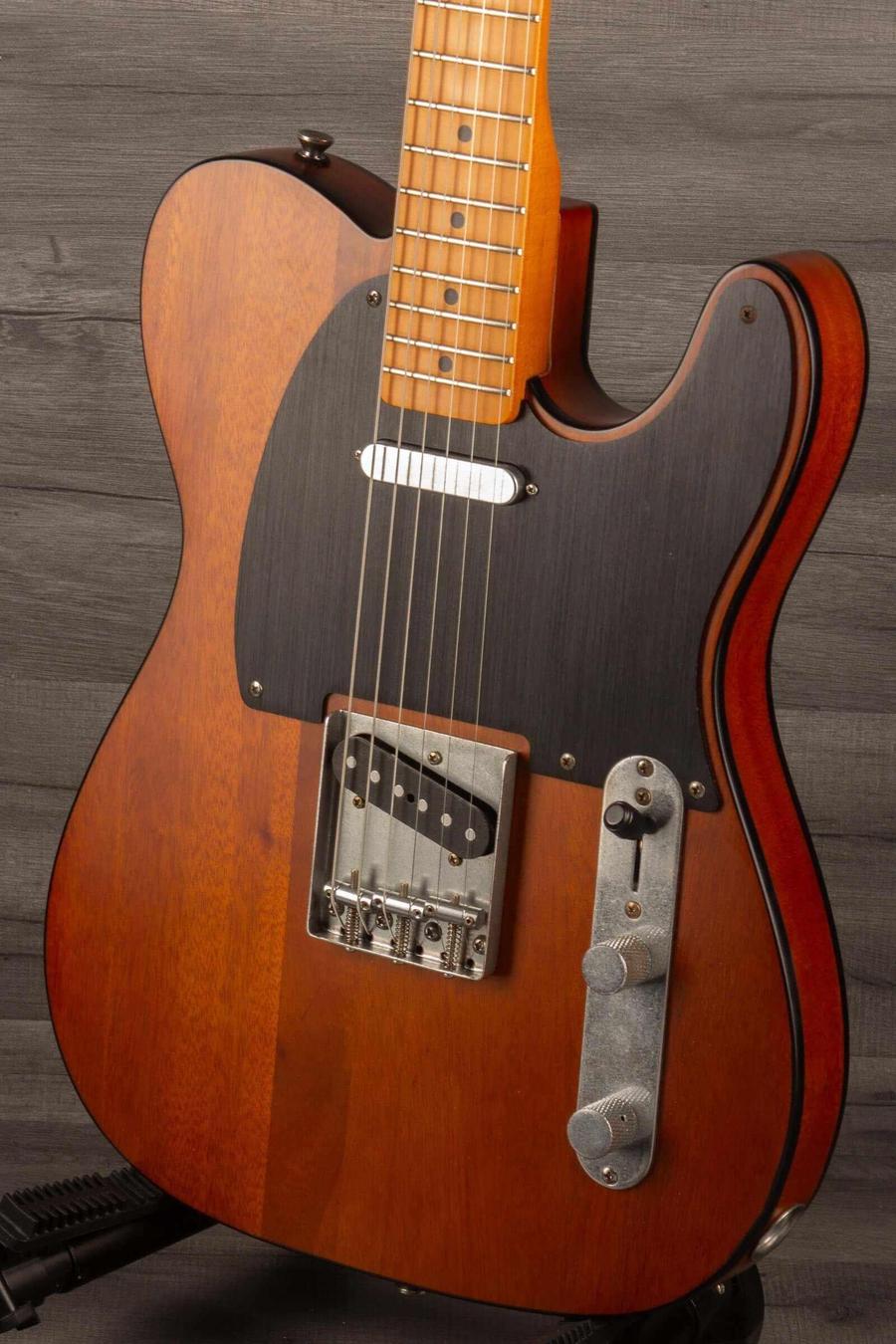 USED Squier 40th Anniversary Telecaster vintage edition in Satin Mocha, showcasing its beautiful design and craftsmanship.