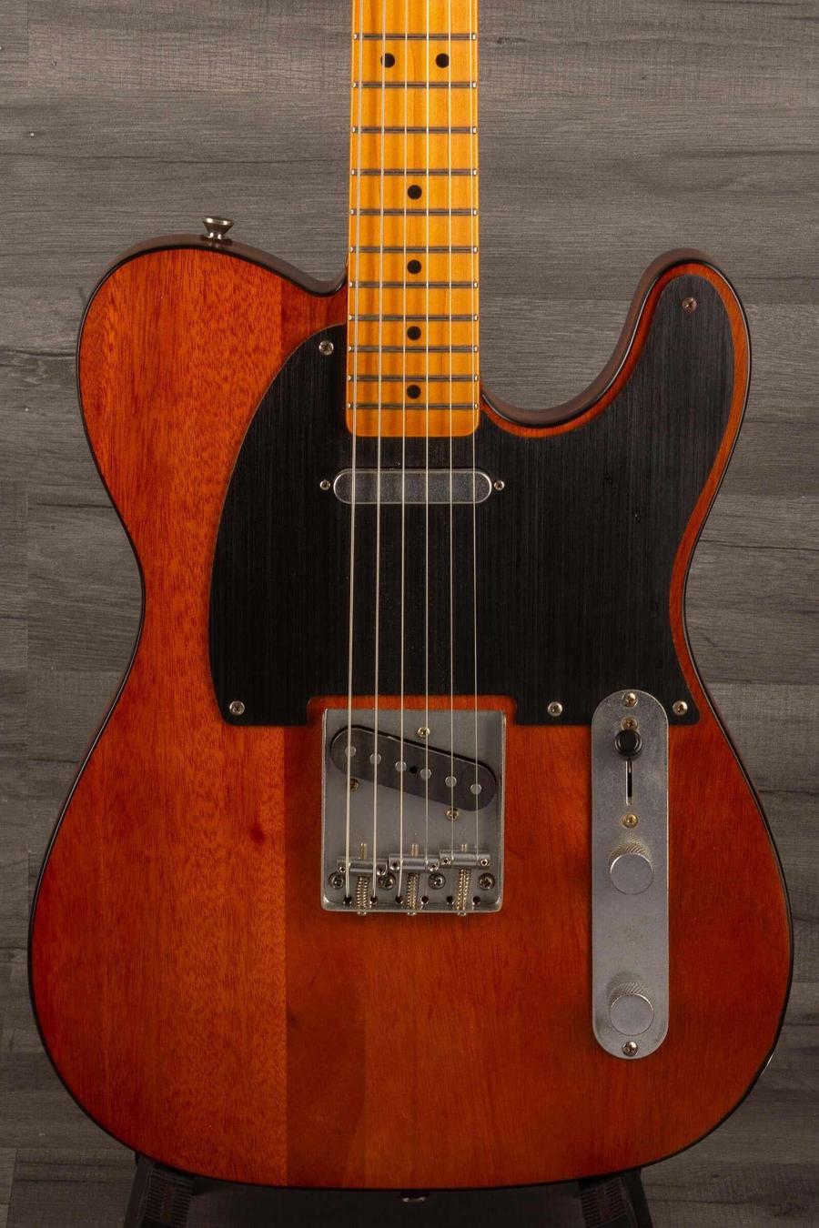 Used Squier 40th Anniversary Telecaster vintage edition in Satin Mocha, showcasing its stunning design and craftsmanship.