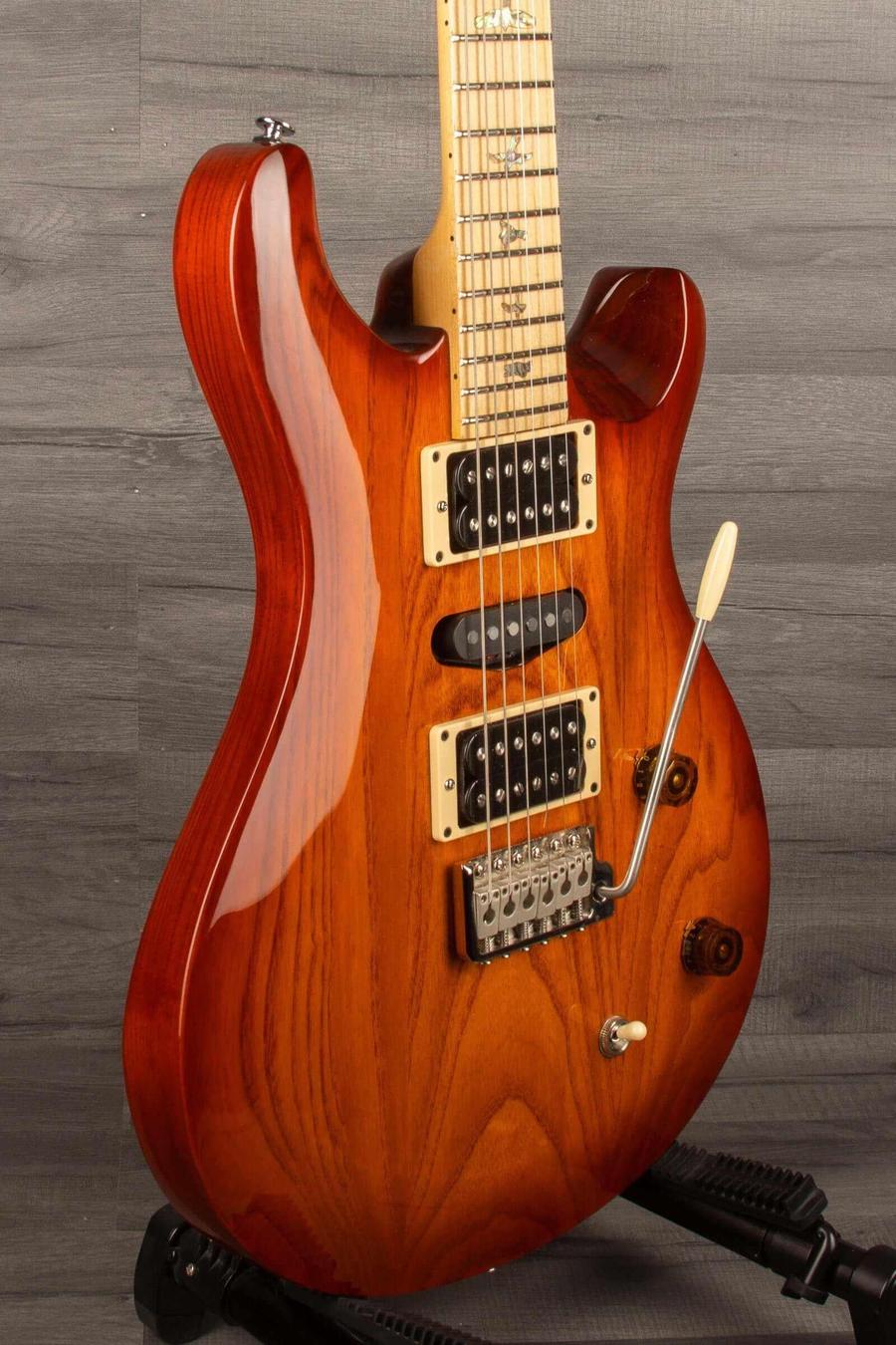 USED - PRS SE - Swamp Ash Special - Vintage Sunburst guitar with upgraded locking tuners and maple neck.