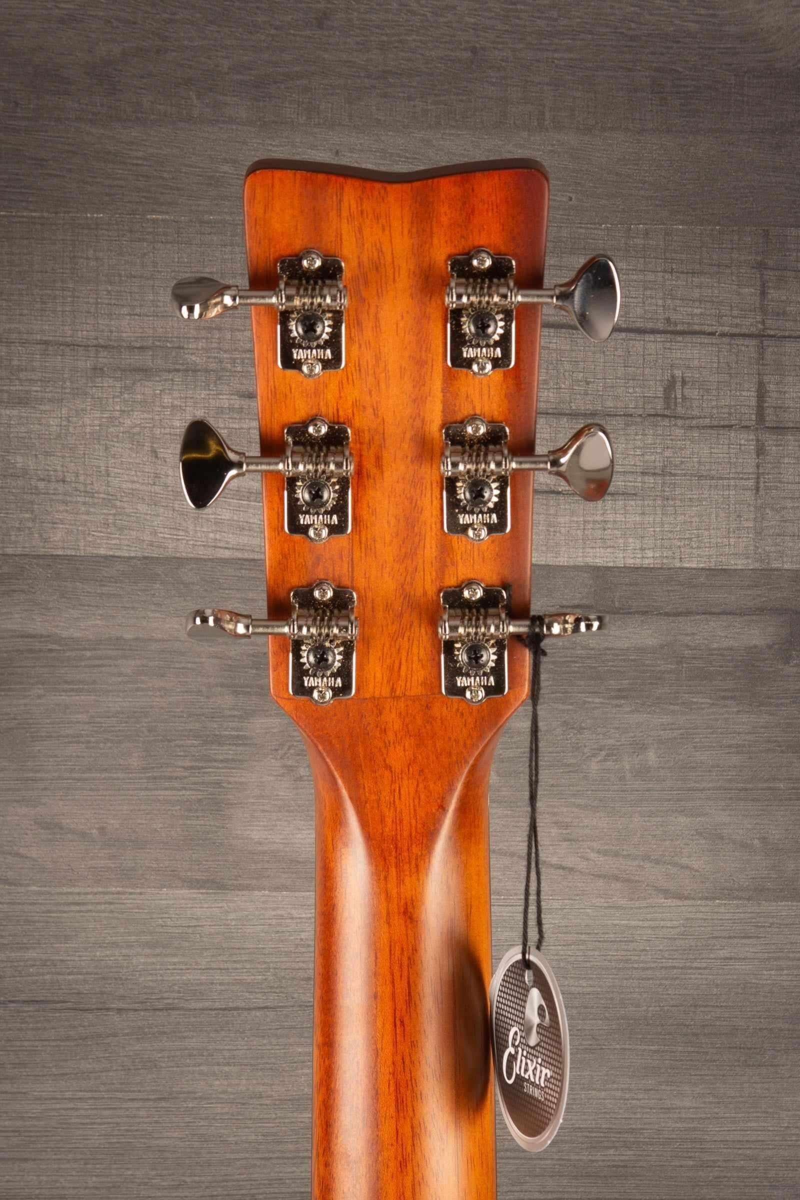 Close-up of the headstock and tuning pegs of a Yamaha FSX3 II electro acoustic guitar.