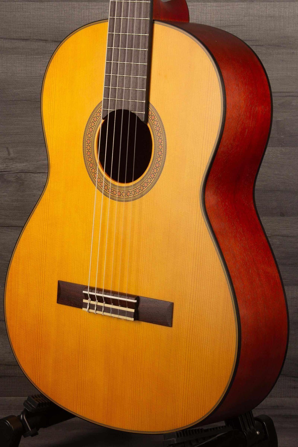 Yamaha CG122MS classical guitar showcasing its beautiful design, perfect for an affordable classical guitar experience.