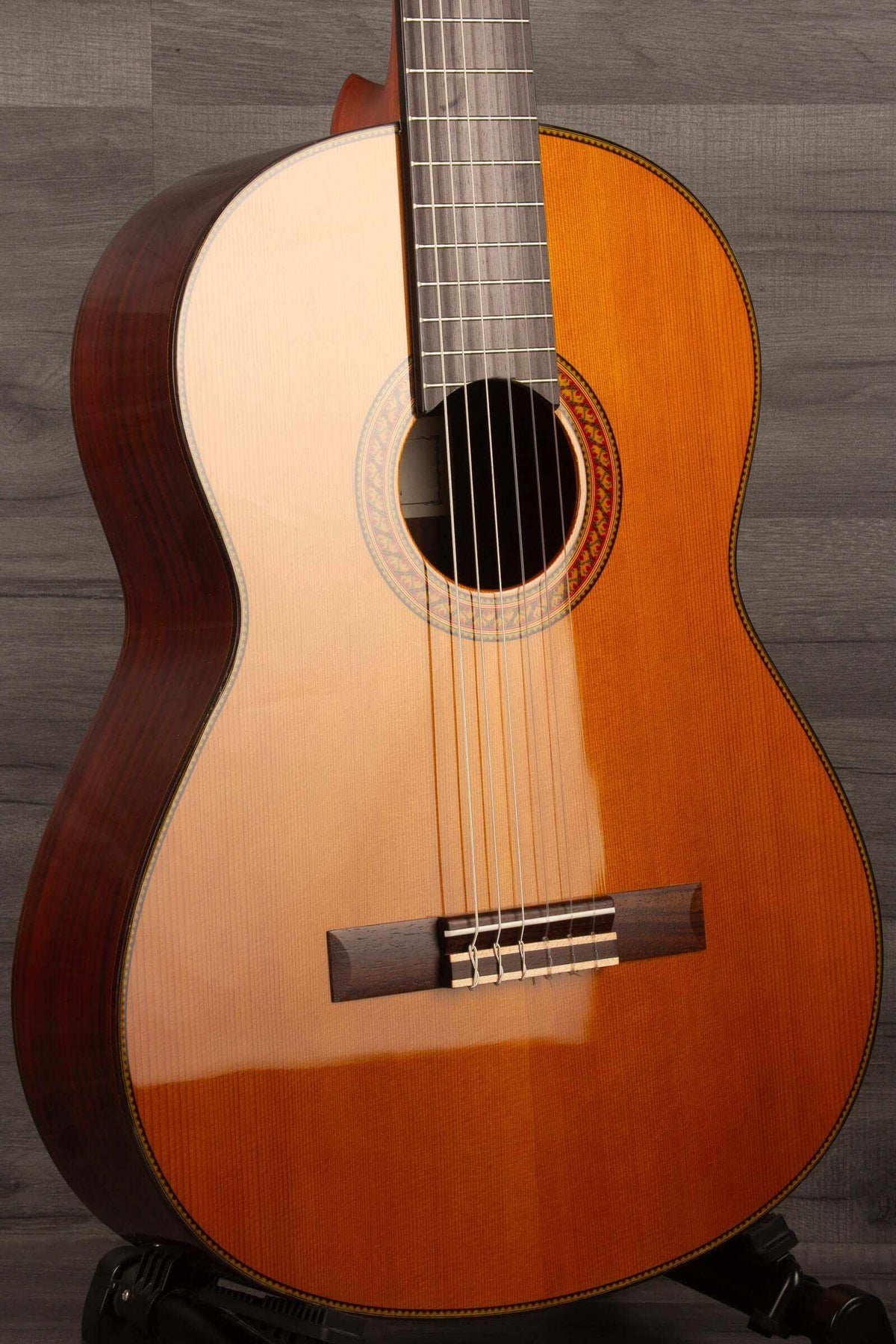 Yamaha CG192C classical guitar showcasing its rich wood finish and traditional design for exceptional sound quality.