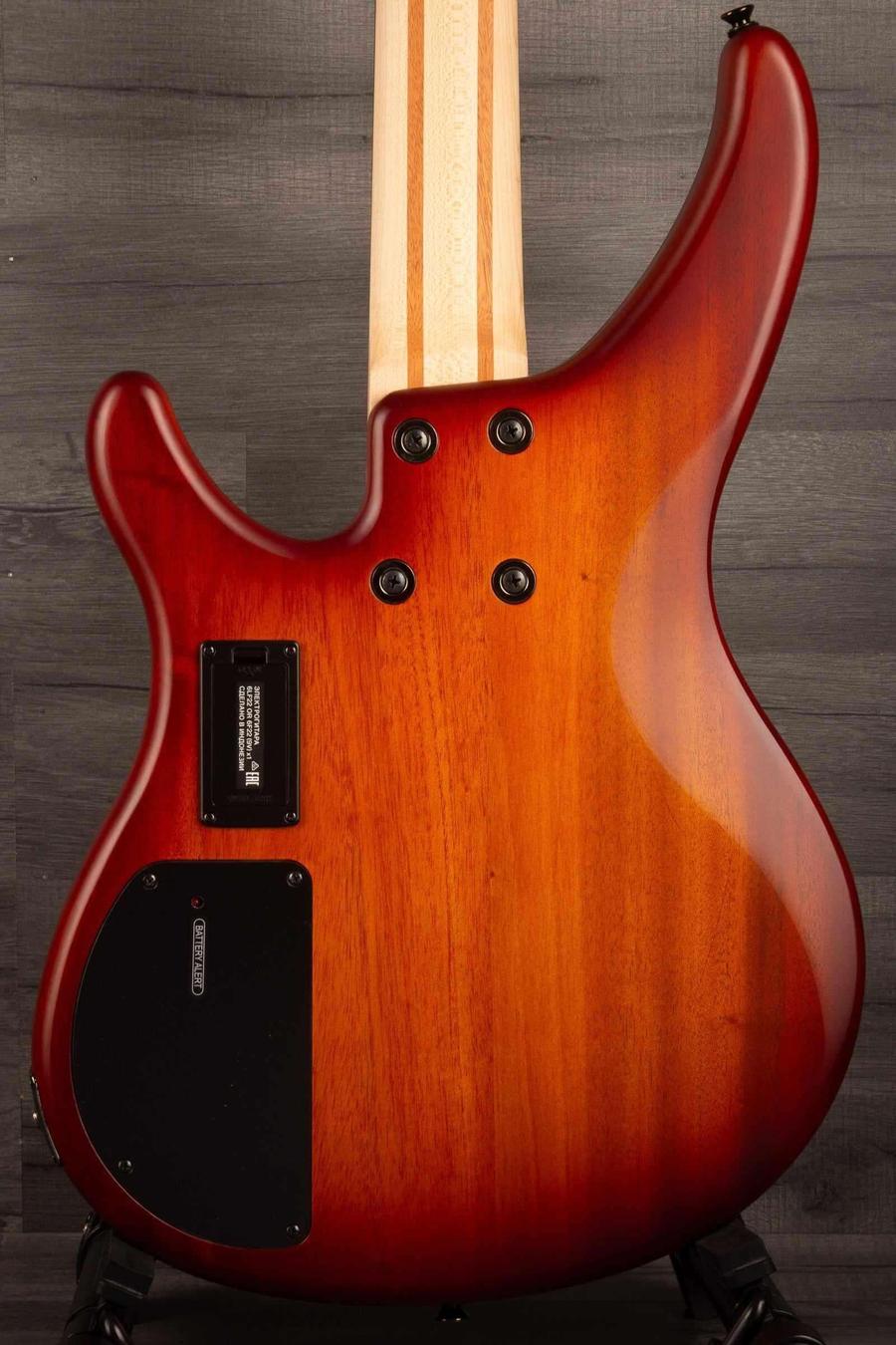 Yamaha TRBX504 Brick Burst Bass Guitar back view showcasing mahogany body and sleek design.