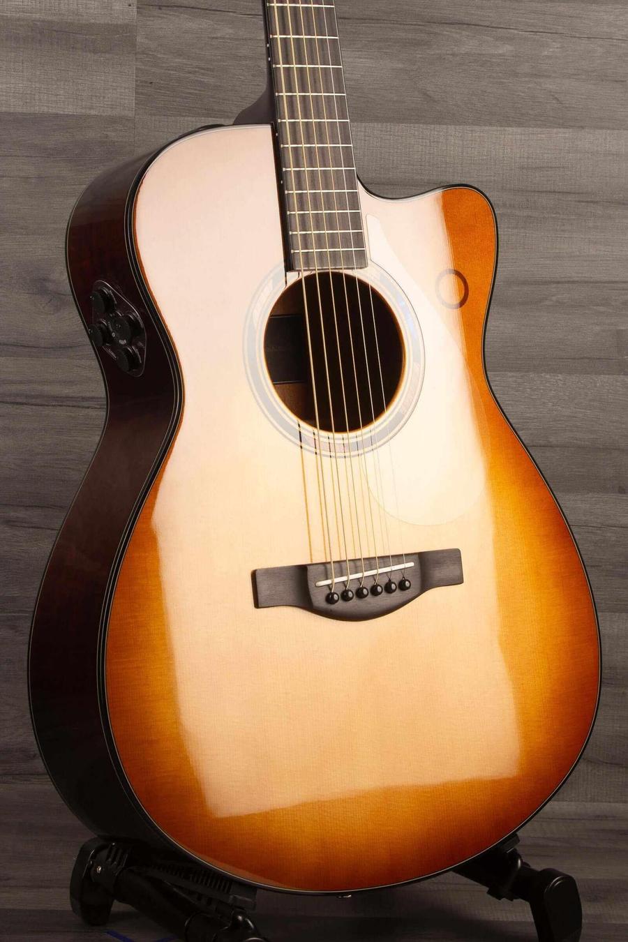 Yamaha TAS3C TransAcoustic Guitar - Sandburst showcasing its solid spruce and mahogany build in concert cutaway shape.