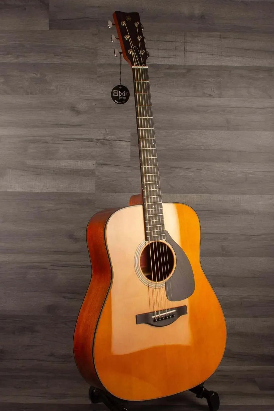 Yamaha FG5G - Acoustic Guitar showcasing high-quality tonewoods and elegant design.