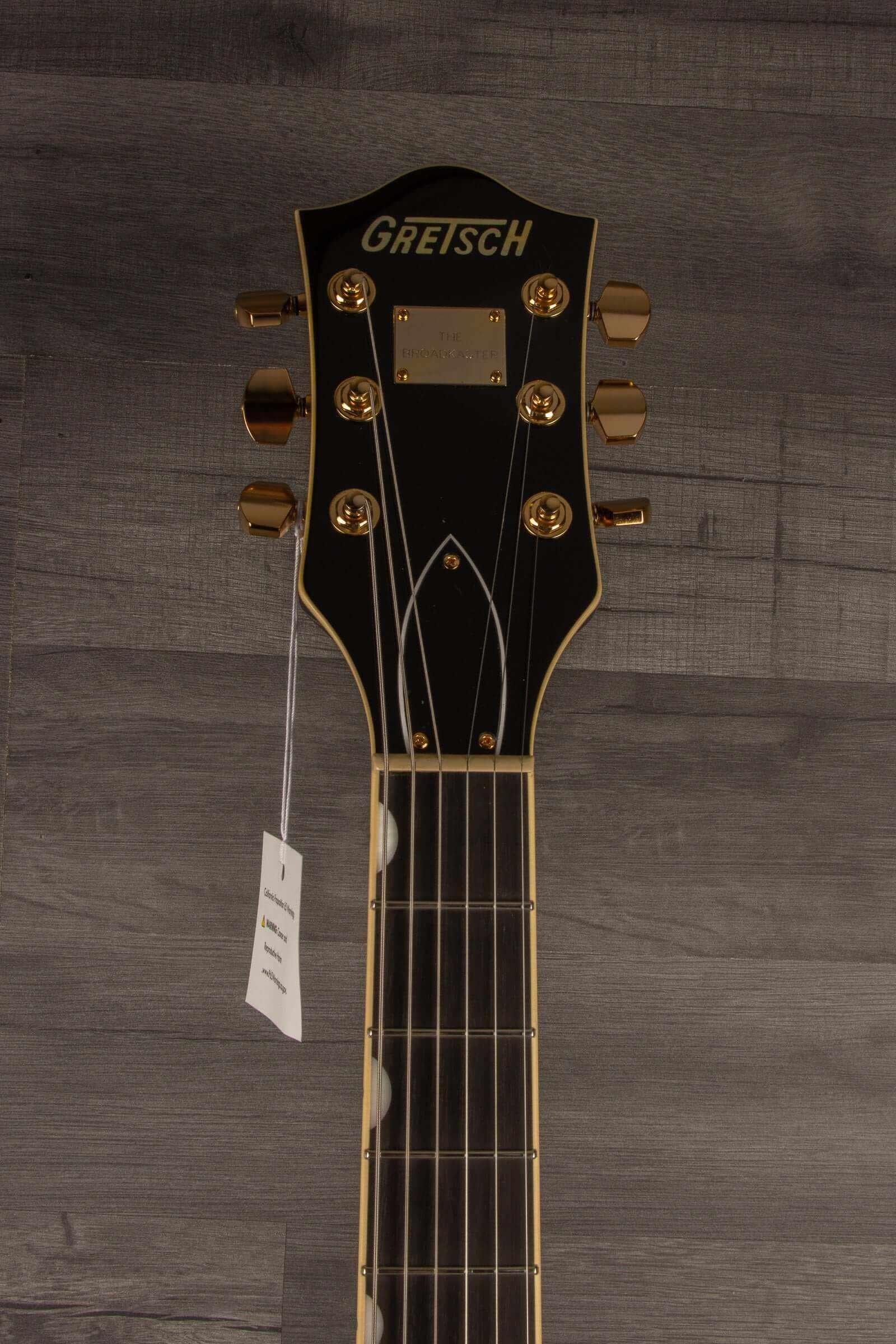 Gretsch Broadkaster® LX Center Block guitar headstock with gold hardware and ebony fingerboard.