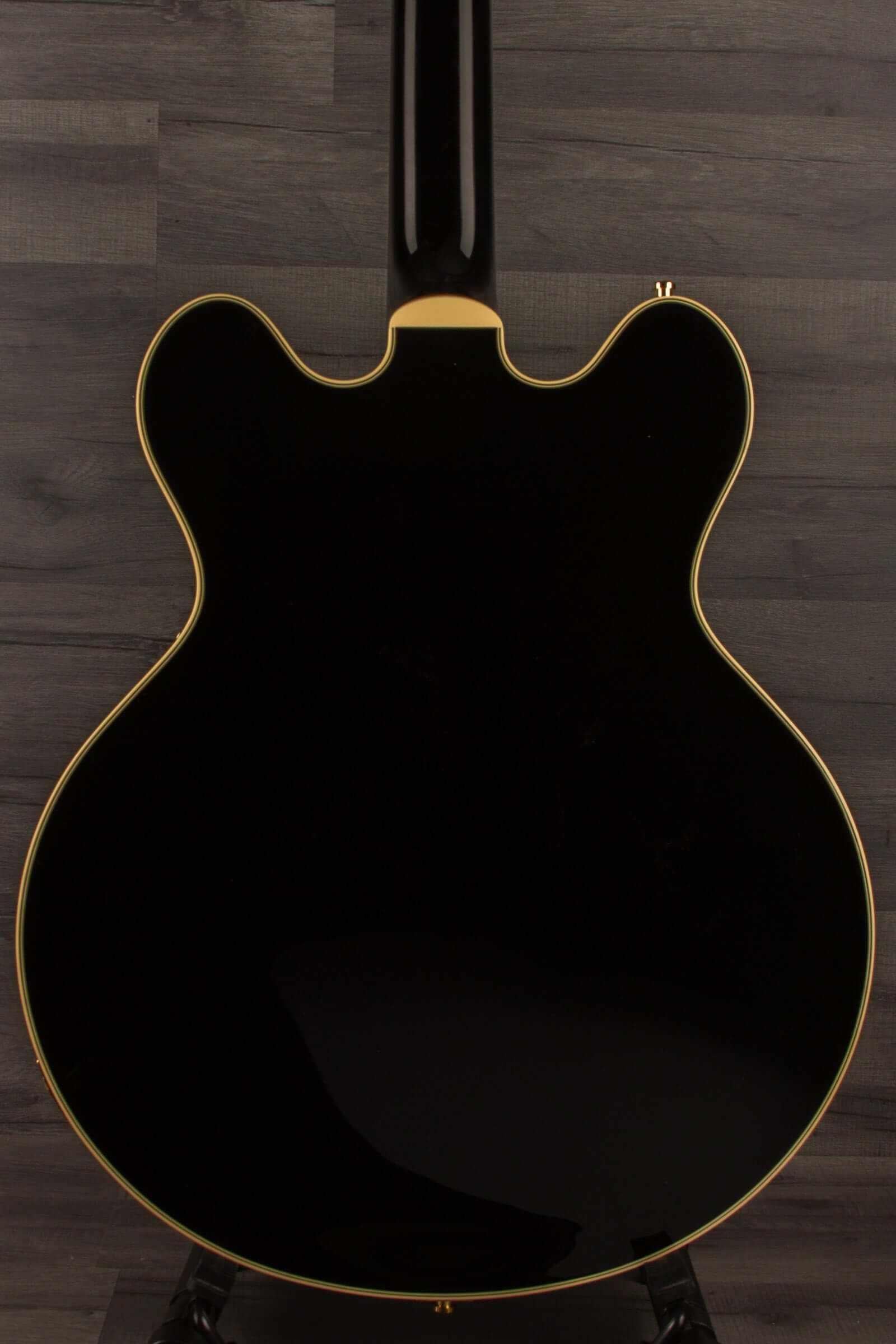 Back view of the Gretsch Broadkaster® LX Center Block guitar in black finish with gold accents.