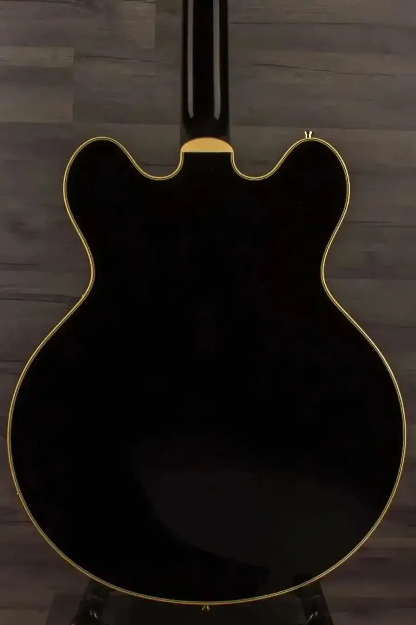Back view of the Gretsch Broadkaster® LX Center Block guitar in black finish with gold accents.