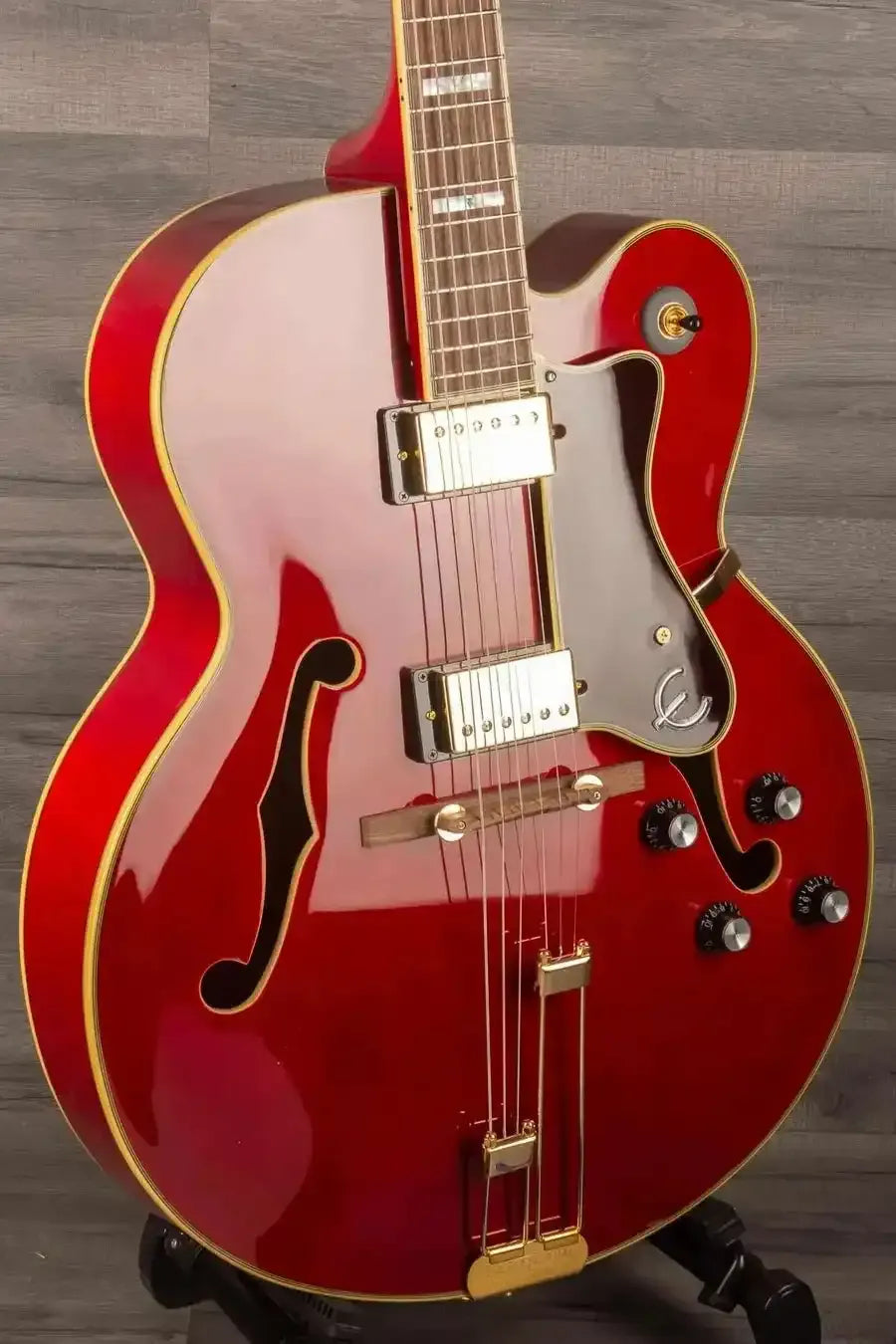 Epiphone Broadway Electric Guitar - Wine Red, Includes Premium Gig Bag side view showcasing its stunning finish and features.