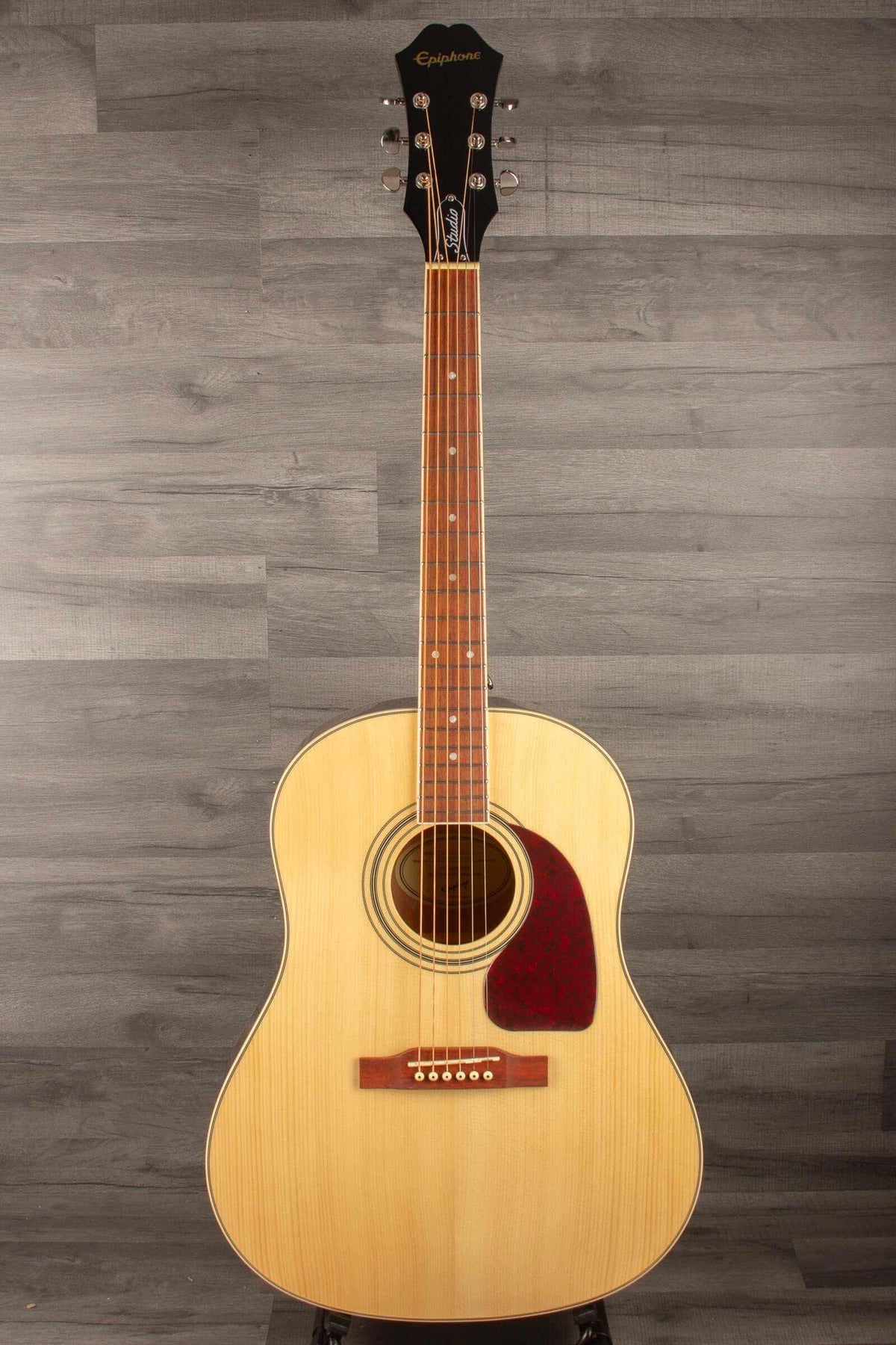 Epiphone J45 Studio Solid Top - Natural, Acoustic Guitar on a wooden background