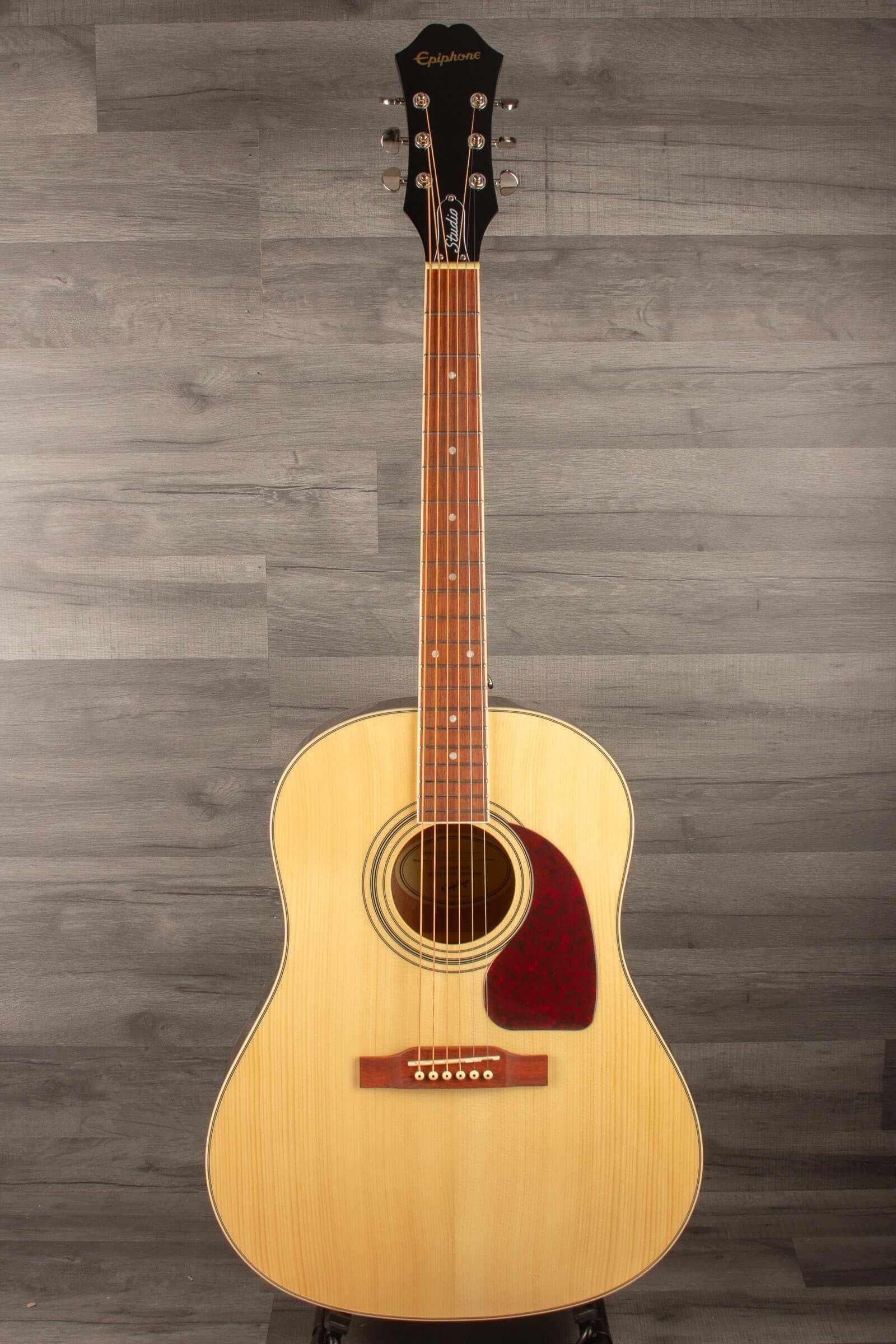 Epiphone J45 Studio Solid Top - Natural, Acoustic Guitar on a wooden background