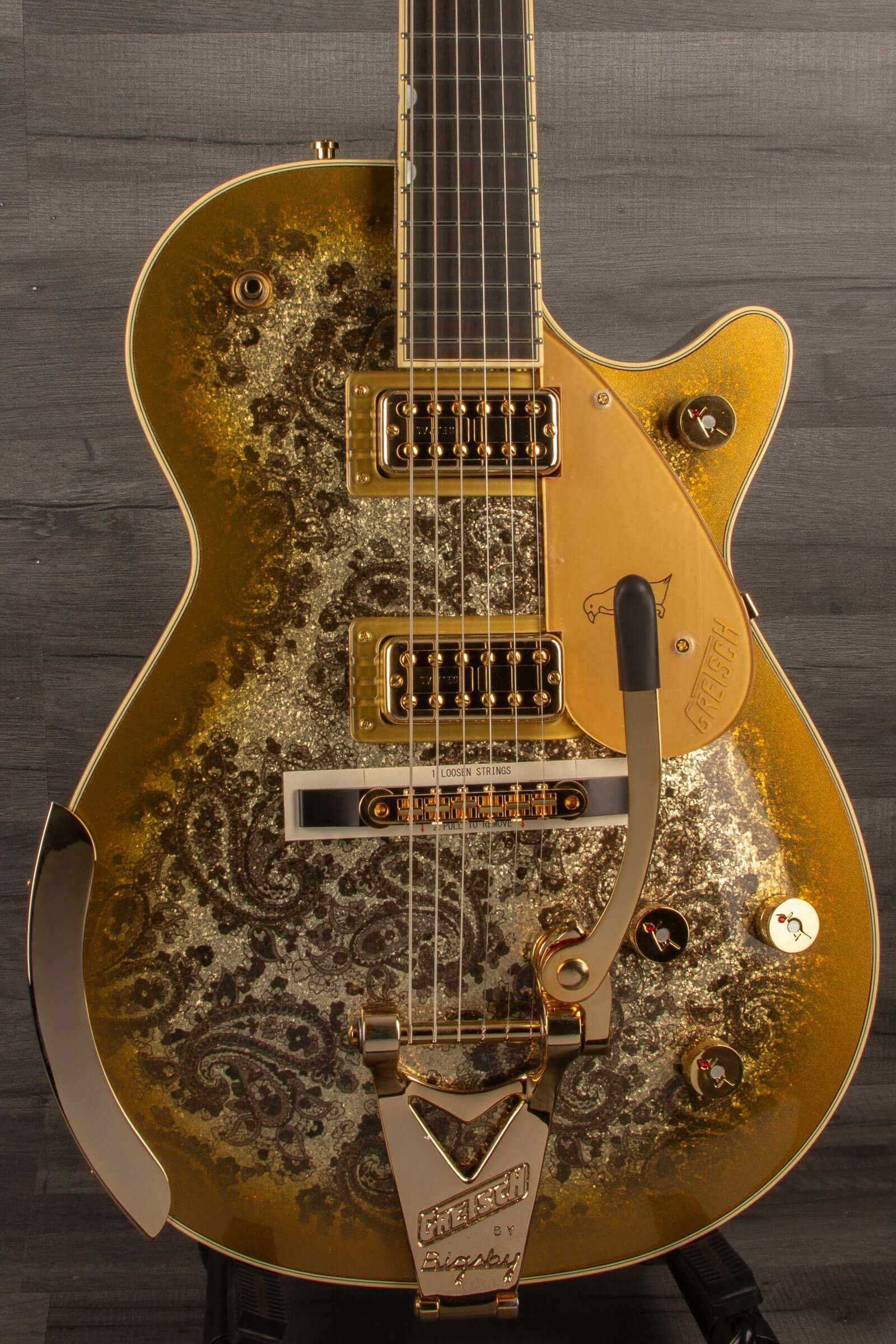 G6134TG Limited Edition Paisley Penguin™ guitar with ebony fingerboard and Bigsby in gold paisley finish.