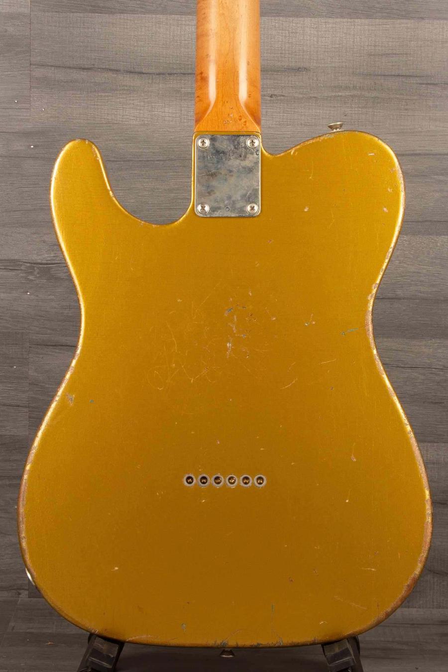 Back view of the Regent 7 - Duophonic All Gold guitar showcasing vintage gold finish and maple neck.