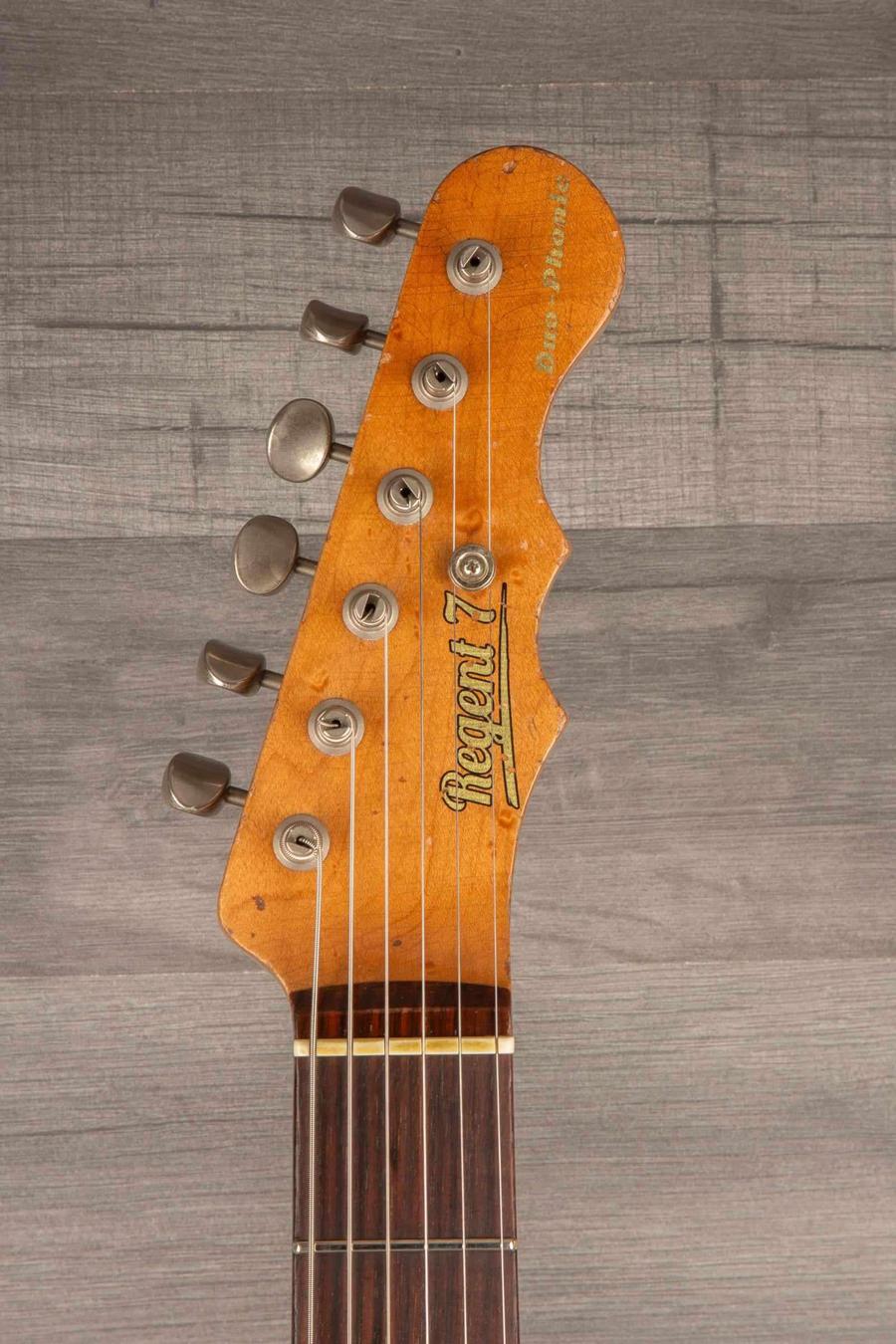 Regent 7 - Duophonic All Gold guitar headstock with rosewood board and vintage tuning pegs.