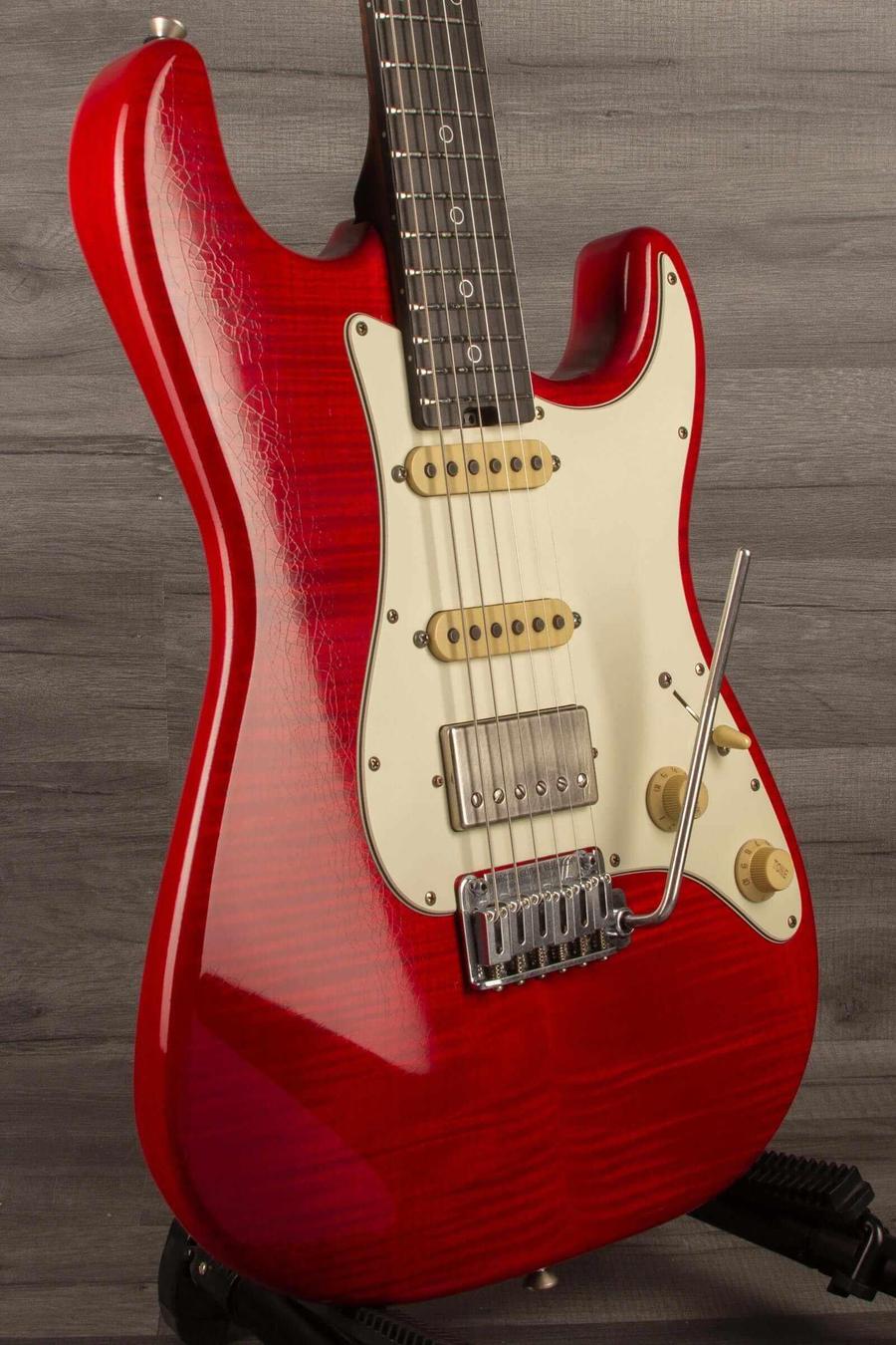 Schecter Nick Johnston Trad Flame Top Wembley Nitro USA in Atomic Fire finish with flamed maple top and aged chrome hardware.