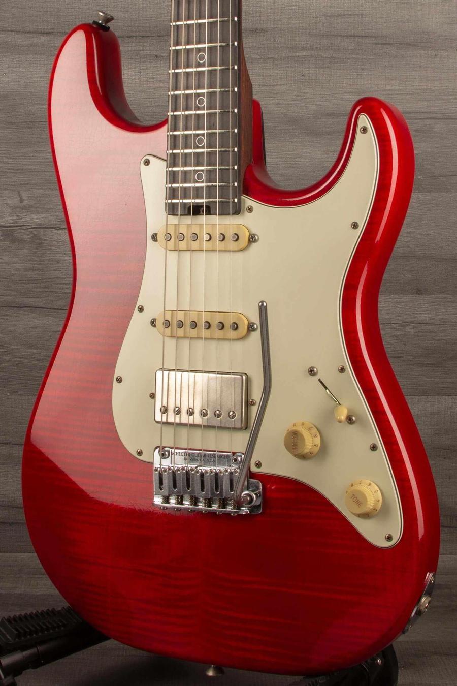 Schecter Nick Johnston Trad Flame Top Wembley Nitro USA in Atomic Fire finish with flamed maple top and silver ring inlays.