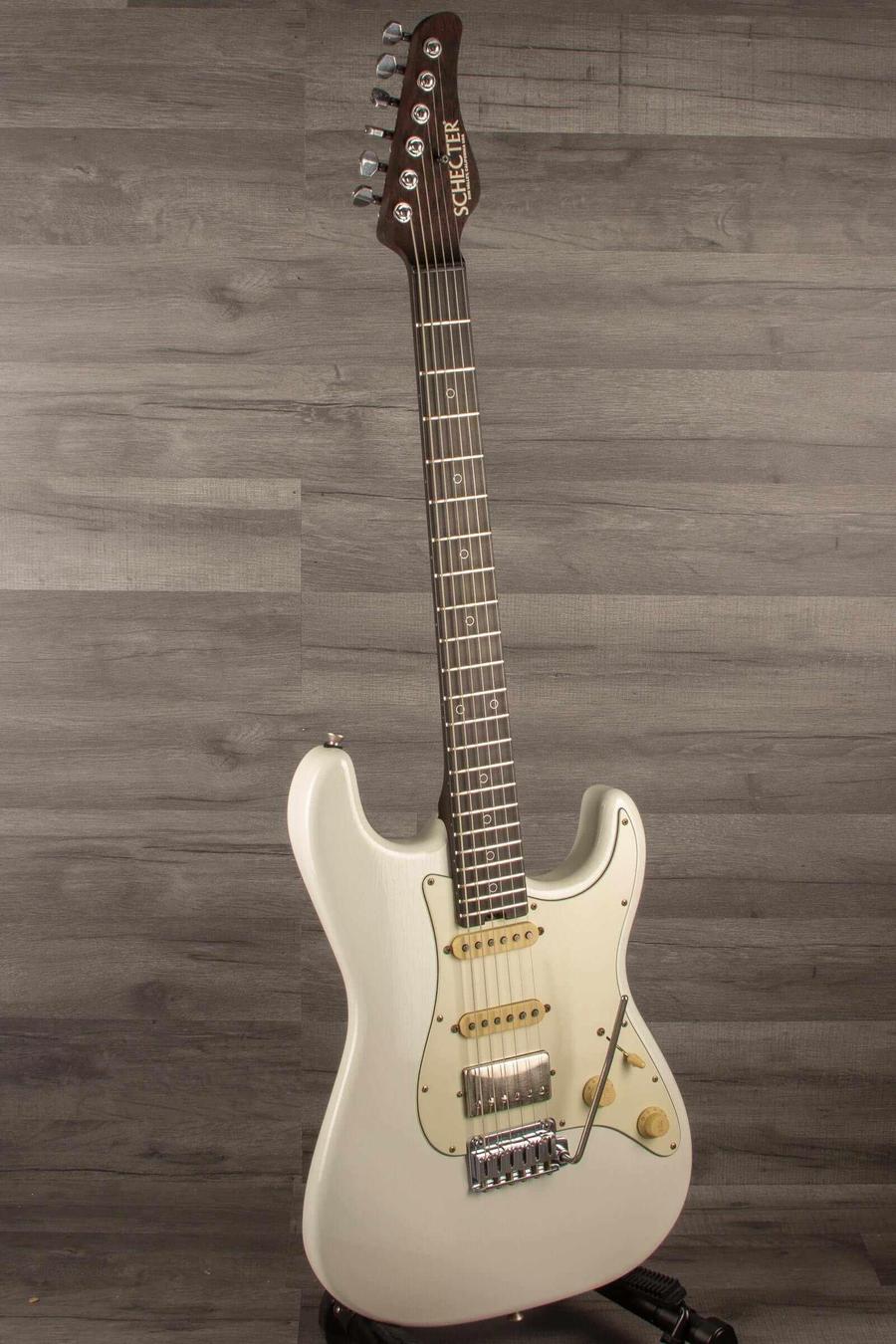 Schecter USA Nick Johnson Traditional Wembley guitar in Atomic Snow finish with nitro coating.