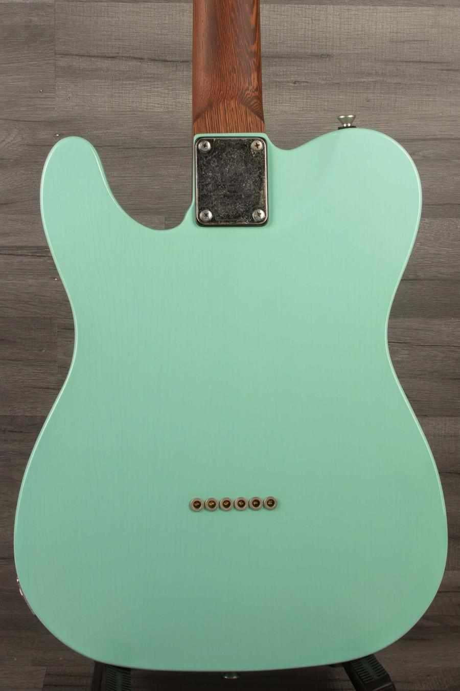 Back view of the Schecter Nick Johnson USA PT Wembley in Atomic Green with a nitro finish for vintage aesthetics.