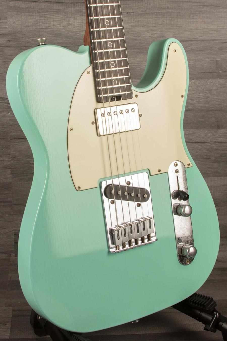 Schecter Nick Johnson USA PT Wembley in Atomic Green with nitro finish, showcasing vintage aesthetics and sonic performance.