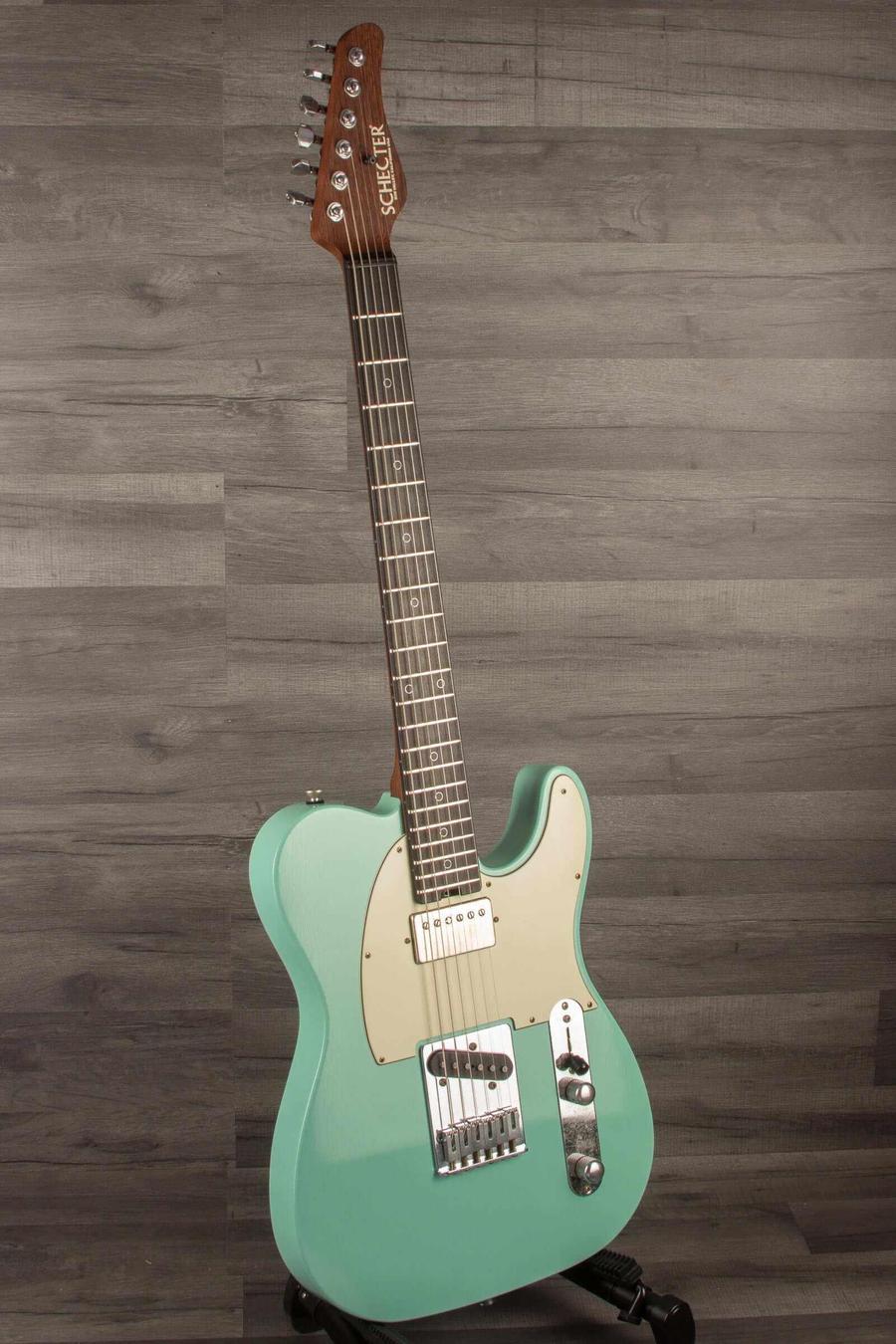 Schecter Nick Johnson USA PT Wembley in Atomic Green showcasing vintage aesthetics and nitro finish.