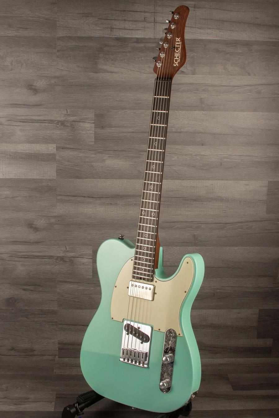 Schecter Nick Johnson USA PT Wembley in Atomic Green with nitro finish for vintage aesthetics.