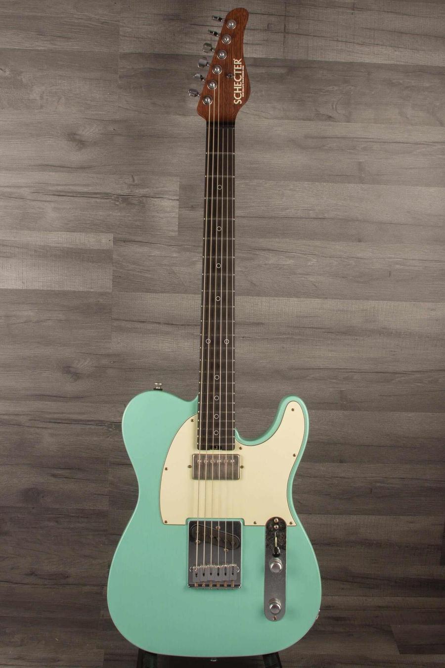 Schecter Nick Johnson USA PT Wembley in Atomic Green with nitro finish for vintage aesthetic.
