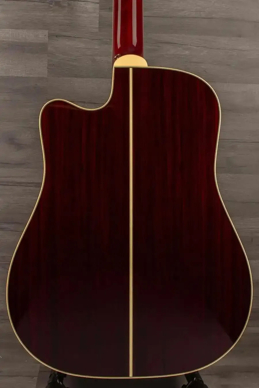 Back view of the Takamine JJ325SRCL-12 John Jorgenson 12 string acoustic guitar showcasing detailed wood finish.