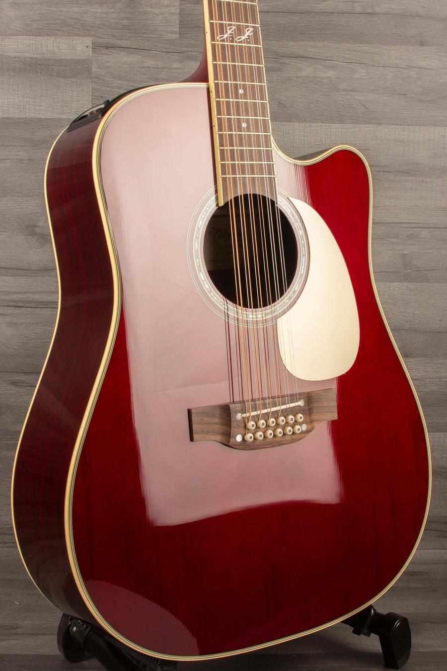 Takamine JJ325SRCL-12 John Jorgenson 12 string acoustic guitar with a glossy red finish.