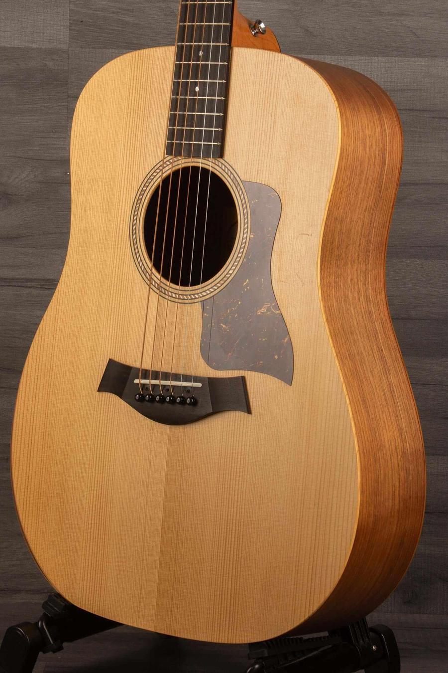 USED - 2022 Taylor 110e acoustic guitar showcasing solid Sitka spruce top and sleek dreadnought design.