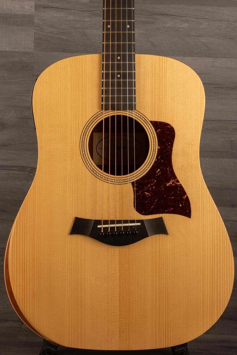 USED - 2022 Taylor 110e showcasing a solid Sitka spruce top and signature NT neck design.