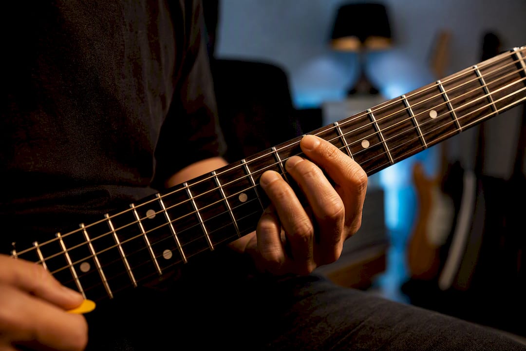 Guitarist practising minor pentatonic positions