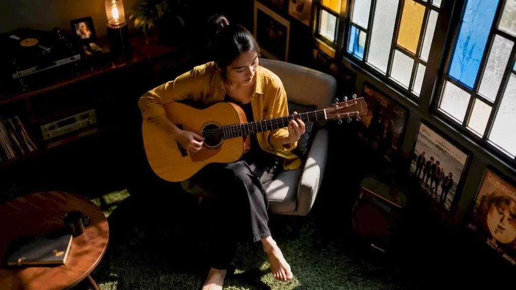 Woman testing comfort with acoustic guitar indoors