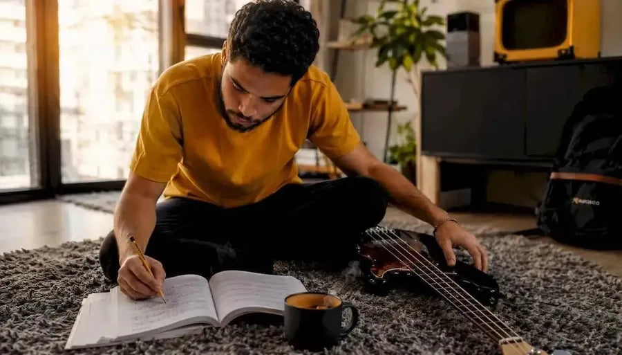 Beginner reading bass guitar tablature at home