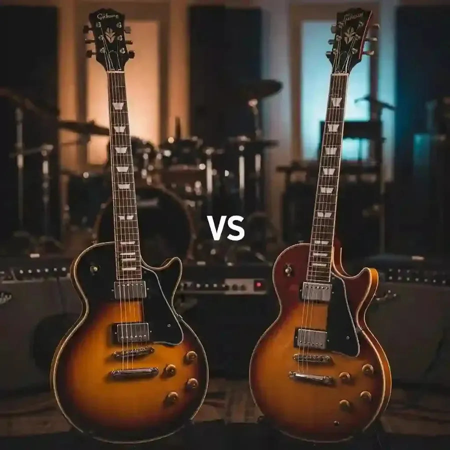 Comparison of Epiphone and Gibson guitars in a music studio