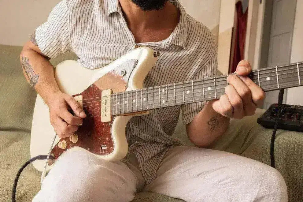 playing the electric guitar