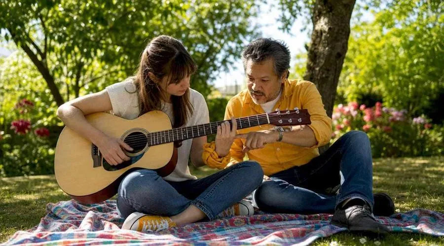 Beginner selecting acoustic guitar at home