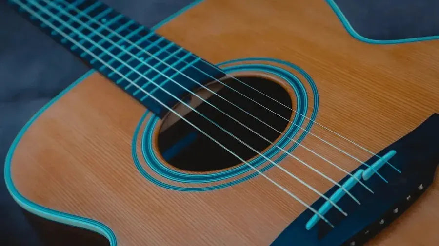 Teens comparing acoustic and electric guitars outdoors