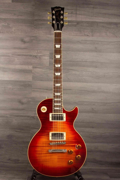 USED - Gibson 1988 Les Paul Pre Historic '59 in excellent condition with flame top and original accessories.