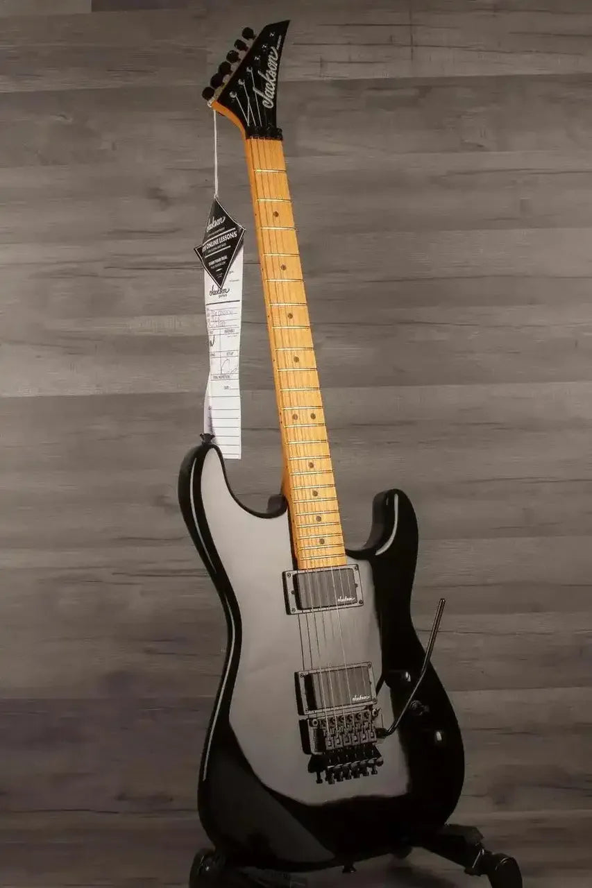 Jackson Pro Origins 1985 San Dimas SD1 HH FR, Maple Fingerboard, Gloss Black guitar on display.