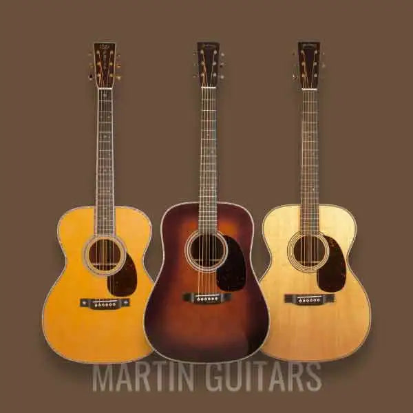 Three Martin guitars displayed together on a brown background showcasing their unique designs and craftsmanship.