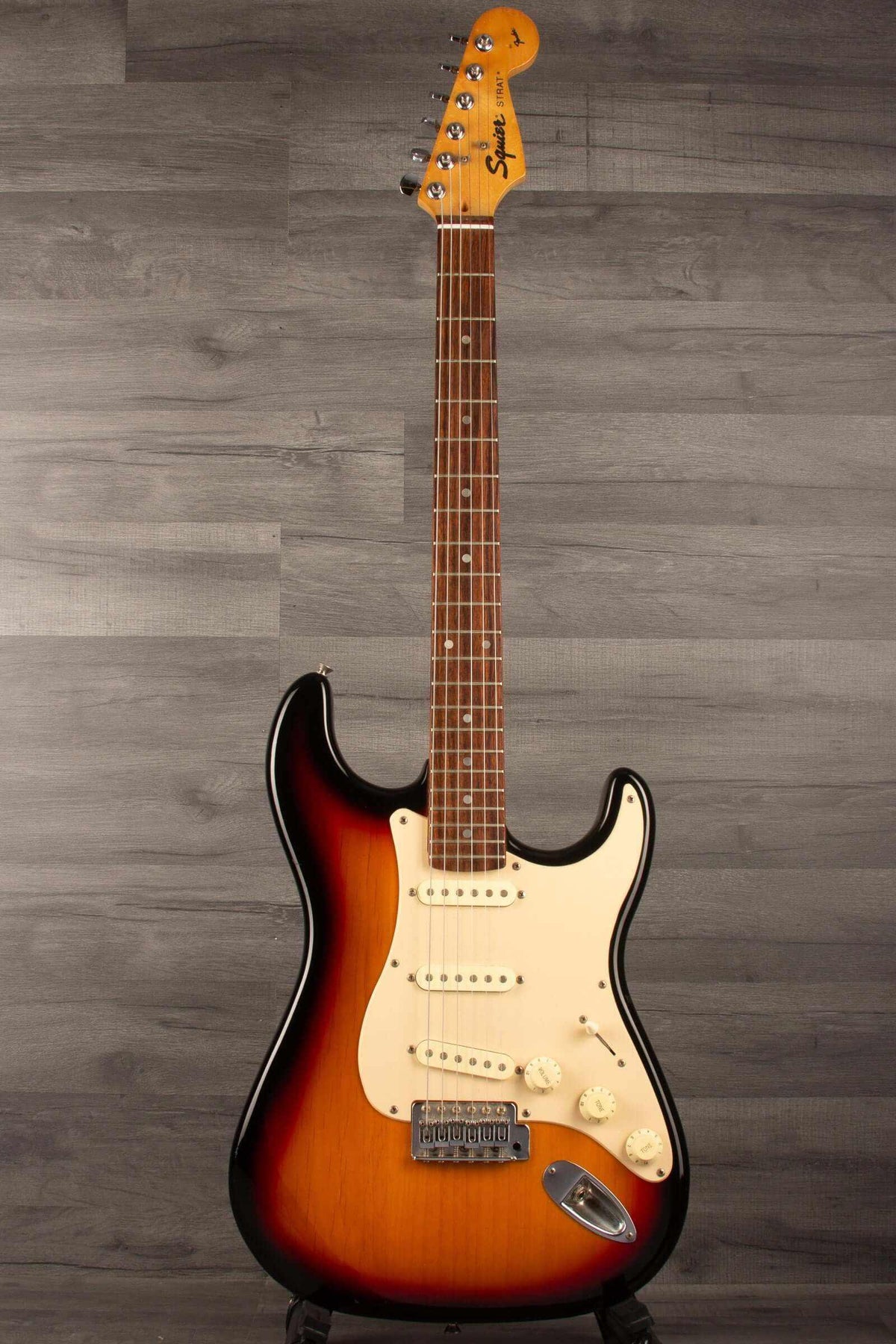 USED - Squier Stratocaster s/b, 1996 model, good condition, rosewood board and slim maple neck with wear signs.