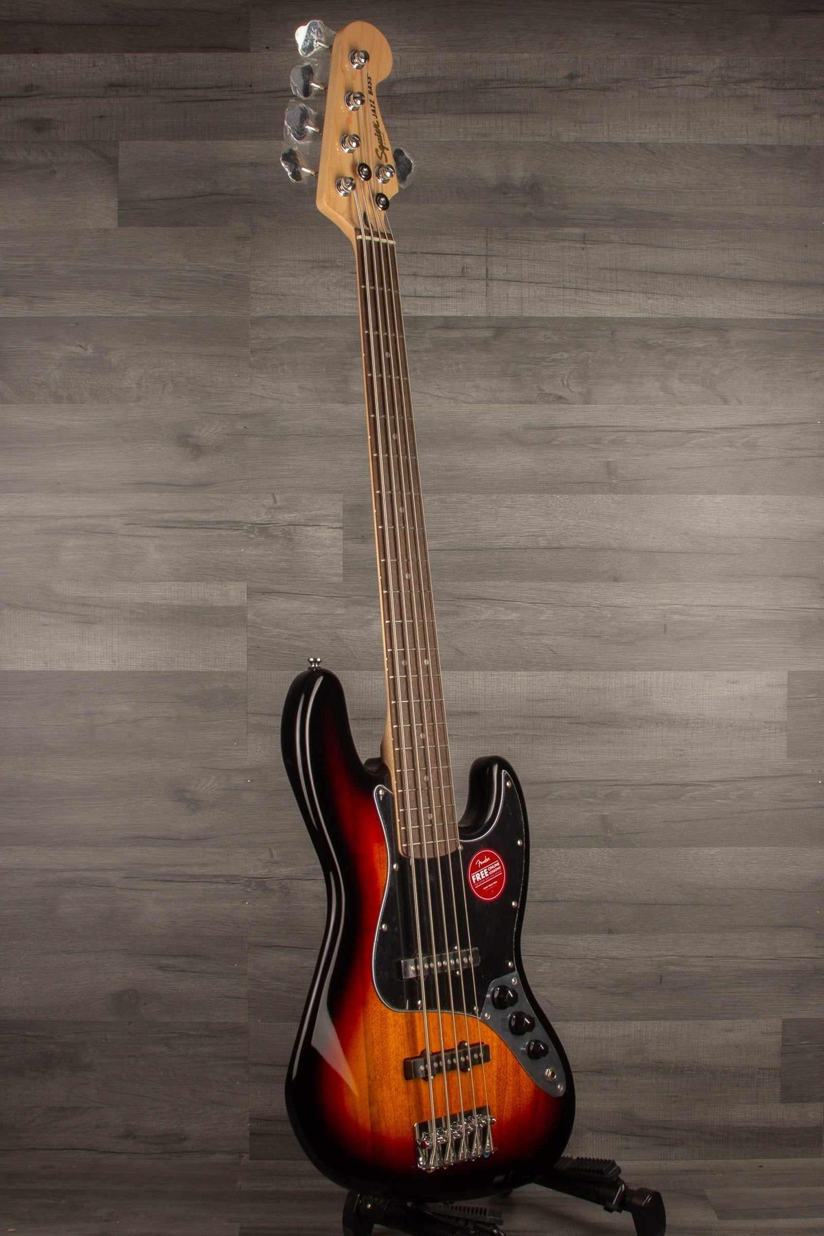 Squier Affinity Jazz Bass V in 3-Color Sunburst with Laurel Fingerboard and Black Pickguard on display.
