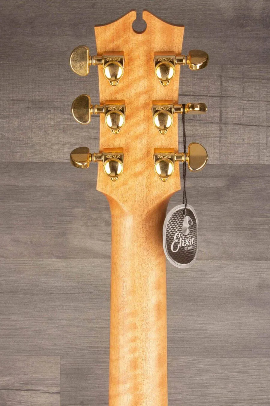 USED - Maton EBG808ART Artist - Acoustic Guitar headstock view with gold tuning pegs and Elixir tag