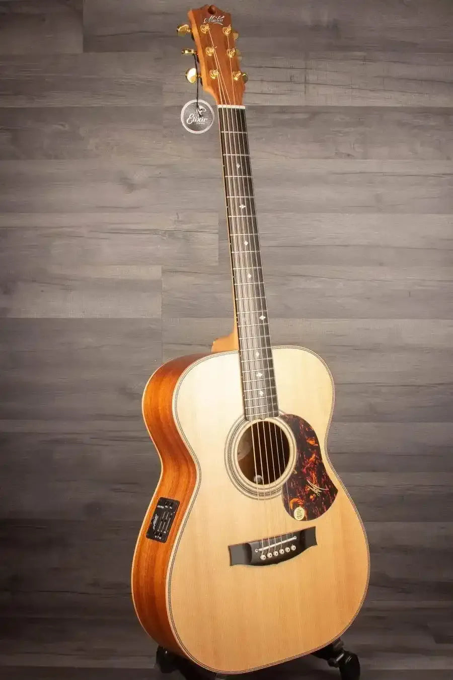 USED - Maton EBG808ART Artist - Acoustic Guitar displayed in excellent condition on a wooden background.