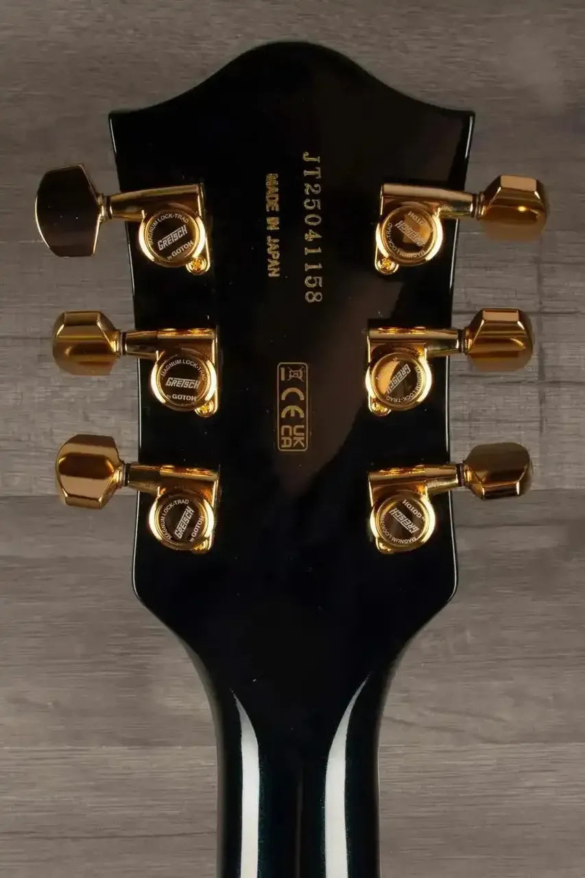 Gretsch Broadkaster® Jr. LX guitar headstock showing gold tuning pegs and serial number, made in Japan.