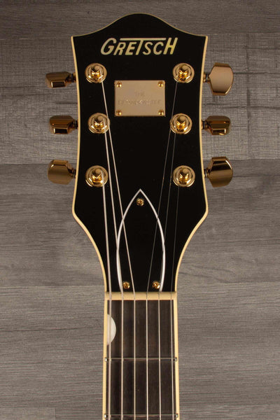 Gretsch Broadkaster® Jr. LX Center Block guitar headstock with gold hardware and ebony finish.