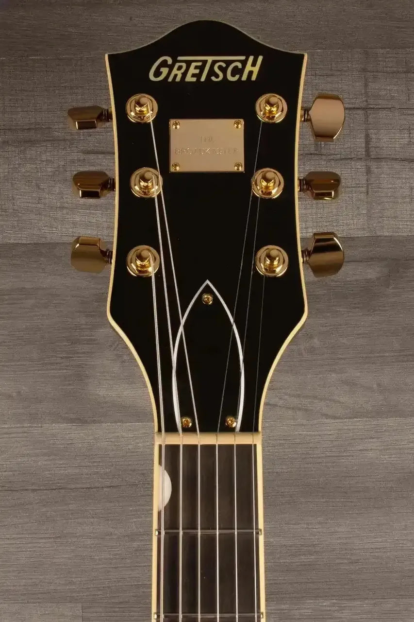 Gretsch Broadkaster® Jr. LX Center Block guitar headstock with gold hardware and ebony finish.