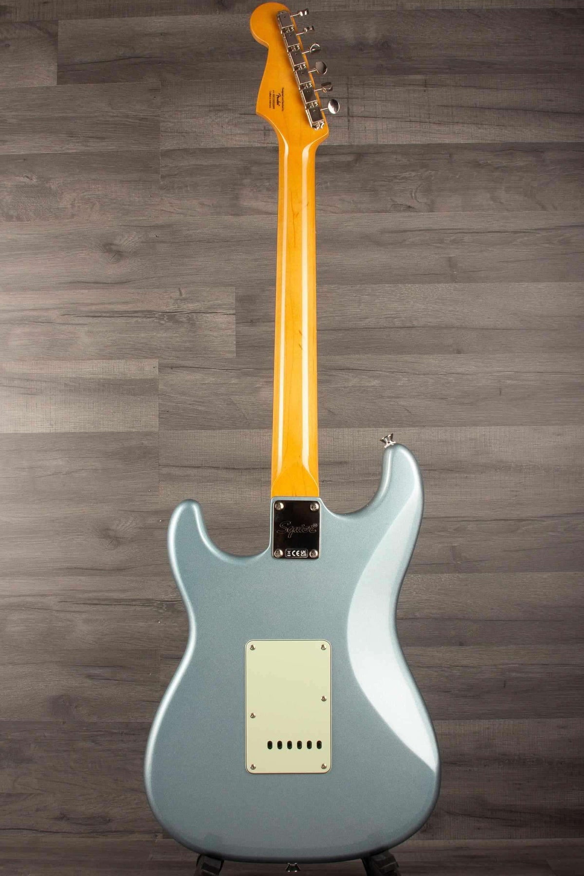 Back view of Squier FSR Classic Vibe 60s Stratocaster HSS in Ice Blue Metallic with mint pickguard.