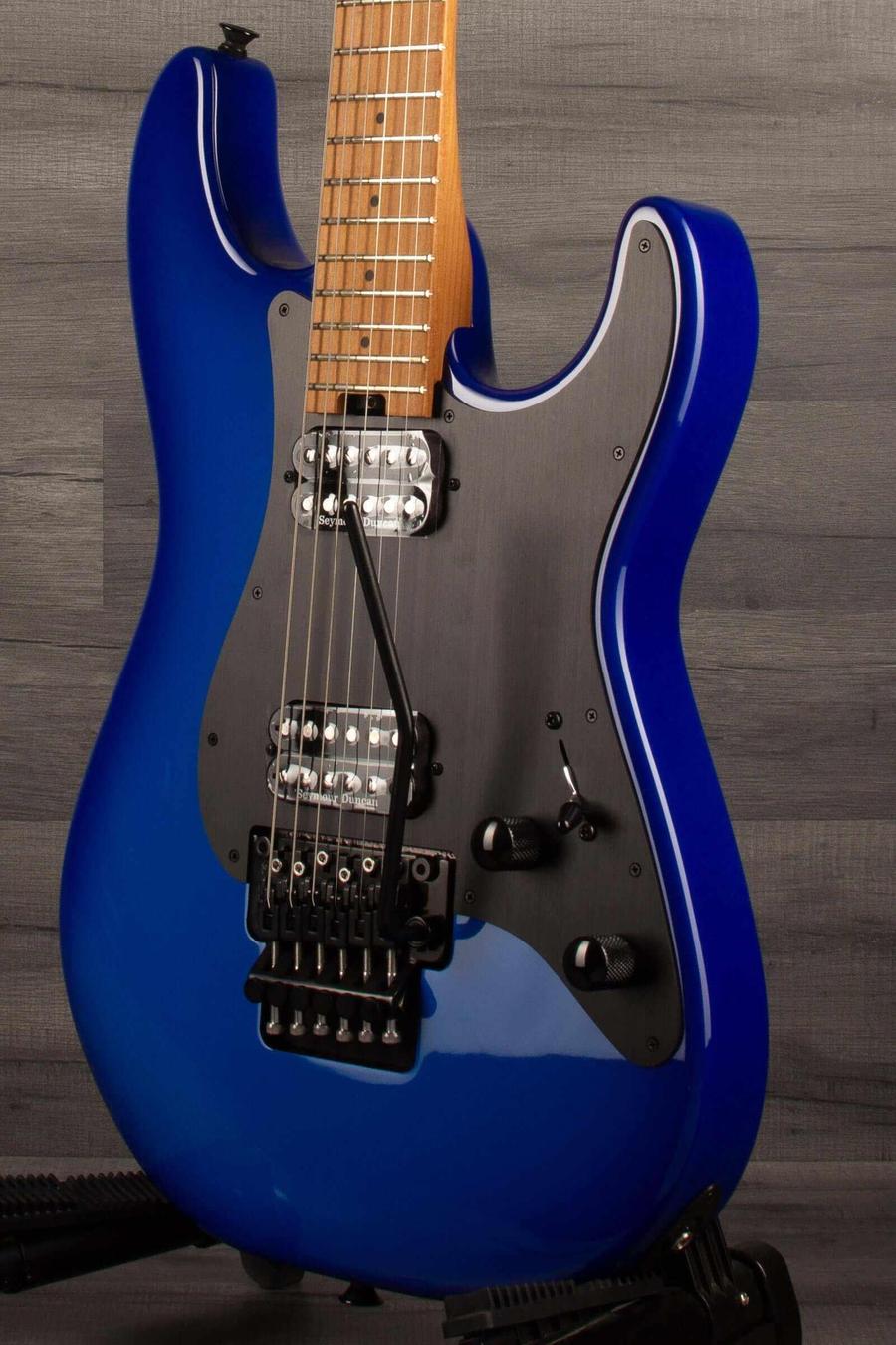 Charvel - PRO-MOD Plus So-cal style 1 HH Floyd rose - Blueburst electric guitar close-up on a wooden background.